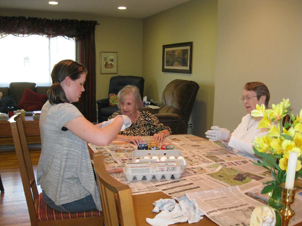 Family-style meal preparation in the dining room
