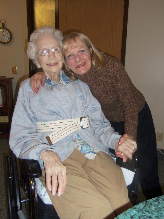 A caregiver spending one-on-one time with a resident